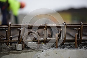 Reo Mesh for Concrete Slab with blurred worker in background photo