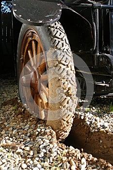 REO Tire Buried in Mud photo