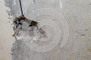 Repair in the apartment. Replacing electrics. Hole in the concrete wall for the wire. Work done with a Rotary Hammer