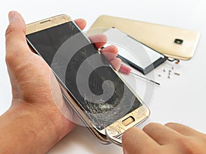 Repair broken smartphone on white background