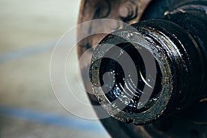 Repair of car brake discs. Hub and brake discs with pads in close-up analysis. Urgent repair in car service