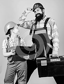 Repair. Children creativity. Bearded man with little girl. construction worker assistant. Builder or carpenter