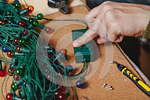 Repair of Christmas tree electric garland