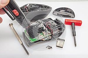 Repair and cleaning of a disassembled computer mouse