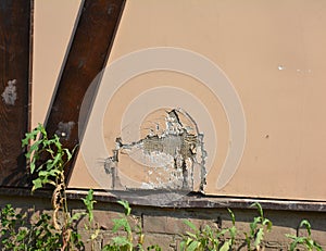 Repair Cracks and Holes in Stucco. Repairing a hole in a stucco wall will require a little patience and some practice.