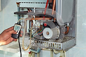 Repair of a gas boiler, setting up and servicing by a service department