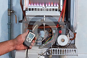 Repair of a gas boiler, setting up and servicing by a service department