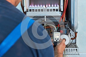 Repair of a gas boiler, setting up and servicing by a service department