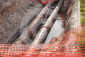 Repair of the heating plant system with the laying of new underground metal pipes in the trench. Reconstruction of the