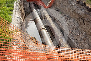 Repair of the heating plant system with the laying of new underground metal pipes in the trench. Reconstruction of the