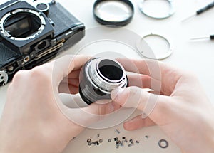 Repair manual camera lens