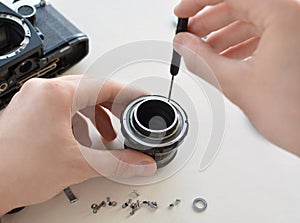 Repair manual camera lens