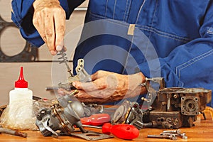 Repair of old parts automobile engine in workshop