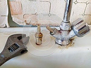 Repair of an old water tap on kitchen