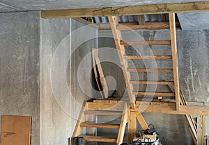 repair and renovation in a wooden house temporary wooden staircase to the second floor