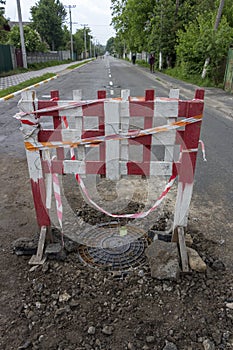 Repair of the road, Installed a protective color fence over the failed hatch