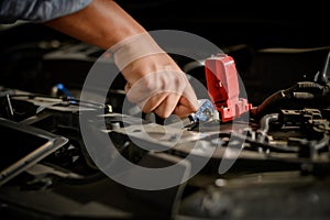 Repair service car Auto mechanic working in garage car mechanic with wrench in garage