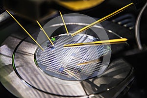 repair Silicon wafer with shimmers chips with different colors for microelectronic devices photo