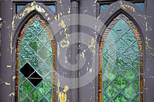 repair of stained glass with lead sealing between square or diamond-shaped