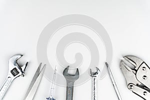 Repair tools Flat lay composition on white background, construction and home DIY