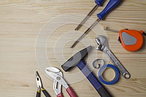 Repair tools Hammer screwdriver tape measure adhesive tape wrench. A set of tools for repairing equipment
