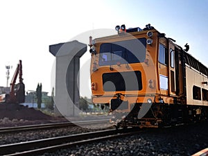 Repair train on the railway in modern train structure background