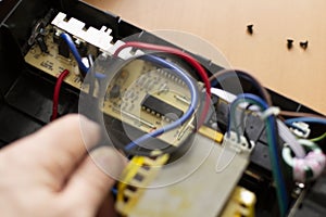 repair of uninterruptible power supply. replacement of battery . close-up