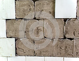 Repair of wall tiles. partially knocked down tile. removing old tiles from the wall.