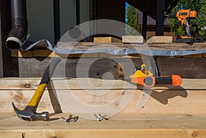 repair of a wooden porch of a country house. natural light