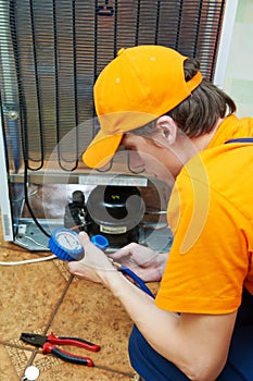 Repair work on fridge appliance