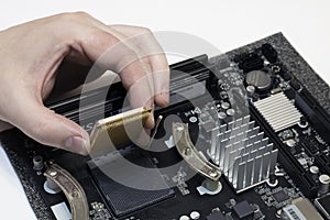 Repairing the computer& x27;s processor, the hand installs the processor