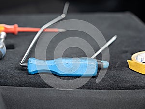 Repairing dents in a car