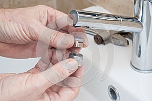 Repairing a faucet in a bathroom