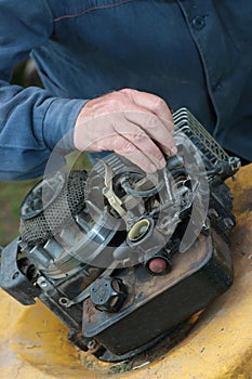 Repairing lawn mower engine