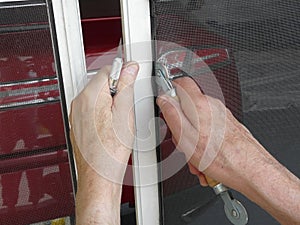 Repairing Screen Door with Spline Tool