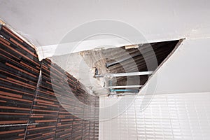 Repairing a water leak damaged ceiling