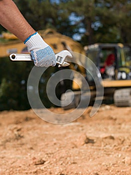 Repairman hand holding french key