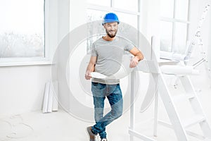 Repairman making repairs in the apartment photo