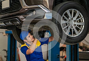 repairman and technician in car garage service in blue uniform standup