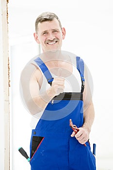 Repairman with thumbs up