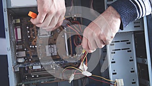 Repairman trying to repair computer. Repair, Service