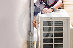 Repairman washing dirty inside compartments air conditioner, Technical clean mold in system air conditioning system