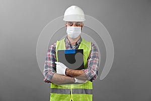 Repairman worker with clipboard. Worker man wearing face mask