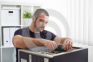 Repairman working with computer