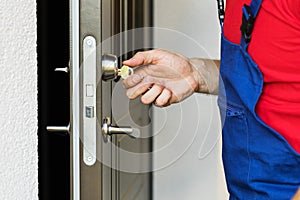 Repairman working with door lock