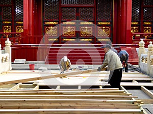 Repairmen repairing Biyong Temple road