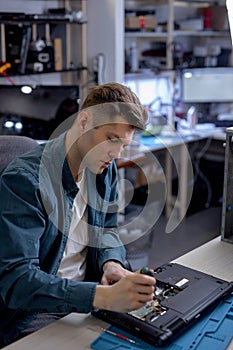 Repairs and diagnostics breakdowns of laptop in professional service center.