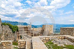 Repairs on Modinakhe fortress built long ago to prove a mans wealth so he could marry a princess but destroyed by an earthquake in