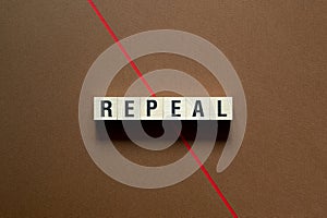 Repeal word concept on cubes photo