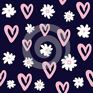 Repeated flowers and hearts drawn by hand with rough brush. Cute girly seamless pattern.